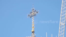 Notre Dame's golden cross visible after years of reconstruction work