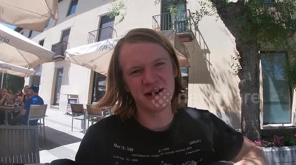 Wildlife photographer films mother stork feeding chicks whilst enjoying breakfast in Spain