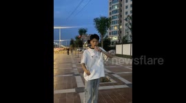 China:  Pretending to Spit Fire