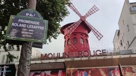 Moulin Rouge in Paris gets windmill sails back in time for Olympics