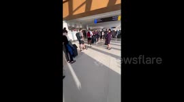 Microsoft outage: Video shows passengers waiting in line to get into airport lounge