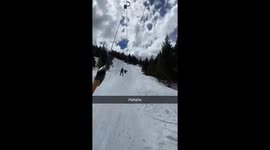 jerry stuck on t bar sliding uphill in the snow