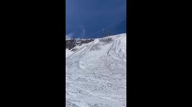 guy drops a small cliff in Powder and then does a spin and eats it