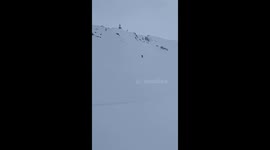 Skier fallls onto cat track and skis come off