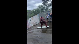 skummy diener rides wave storm down a spill way