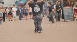 Korean B-Boy Hip Hop Break dance Crew wow visitors in Cornwall Resort. Newquay, Cornwall, UK