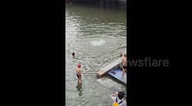 China: Rescuing Drowning Victims