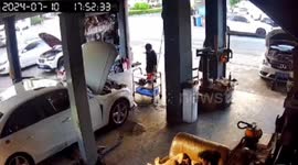 Car engine catches fire at vehicle repair shop