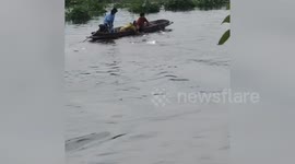 Noodle seller rescues mother and son drowning in river
