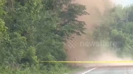 Explosive ordnance team detonates IED hidden in roadside in southern Thailand