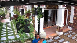 Plant pot falls perfectly onto man's head during winds from typhoon