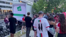 USA: A view from behind Palestine supporters protesting in front of the Watergate Hotel