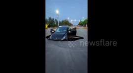 Tesla swallowed by sudden road collapse in central China