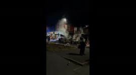 Shattered glass & scorched wreckage baffle couple in the aftermath of Leeds riot