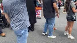 Protestors chant “All Zionists are racist.”