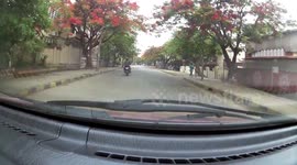 Biker Narrowly Misses a Head-on Collision