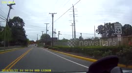Kids doing stunts ride bikes into oncoming traffic
