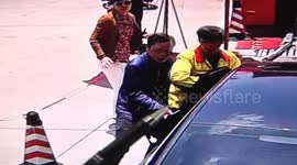 Car moves backwards itself after female driver engages the wrong gear