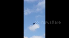 Military Osprey aircraft  flying over London, UK