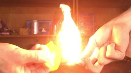Slow-motion footage of a lemon creating a ball of fire