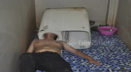 Man manages to get head stuck in washing machine