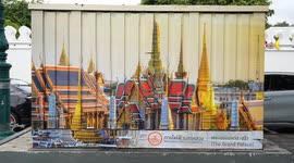 Transformer boxes decorated with images of Thai tourist spots