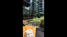 Man's nail clipping over the restaurant's outdoor seating upsets the patron