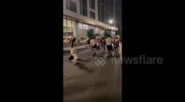 USA: Palestine supporters now marching in the opposite direction from before, eventually stop in front of the Watergate Hotel