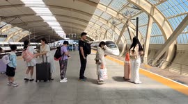 China: Passengers Wait to Take A High-speed Train in Changzhou