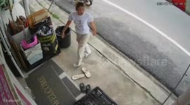 Woman holds out hand to check for rain... but accidentally flags down police