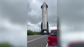 Huge space rocket rolls along road - forcing traffic to pull over