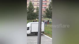 Russia: Woman pushes and kicks cop before chasing him down street