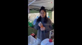 Woman plays with husband's flame gun and can't stand the heat!