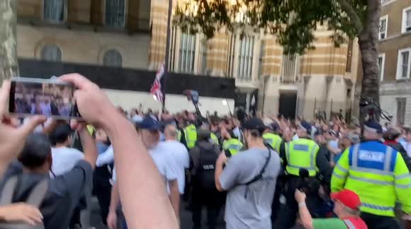 Protesters attack police in Westminster following the stabbings in Southport