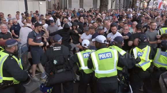 Clashes in London between protesters and police in wake of Southport disorder
