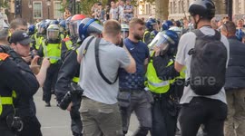 A Protester is Arrested and Escorted Away By Police Following A Protest in Central London on Wednesday Night