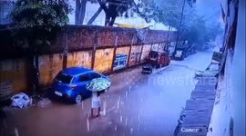 On Camera: Man Narrowly Escapes Death As Boundary Wall Collapses After Heavy Rains In Prayagraj*