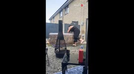 Woman jokes with her husband and gets pulled into the hot tub by him