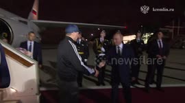 Putin meets released Russians at airport