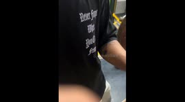 Young man carries snake on shoulder in Gomel, Belarus