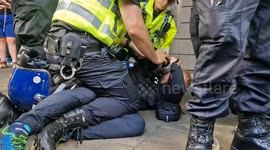 Man arrested at the edge of the enough is enough protest & counter protest. In Manchester, England
