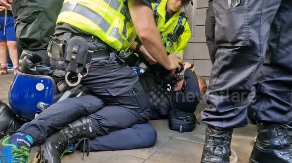 Man arrested at the edge of the enough is enough protest & counter protest. In Manchester, England