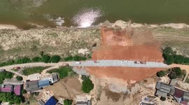 Dike breaches sealed in rain-hit central China