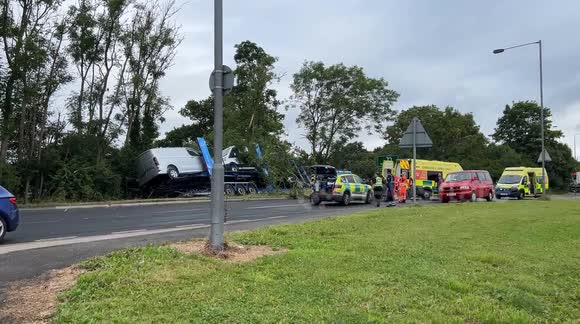 Car transporter crashes off road and smashes into trees in York