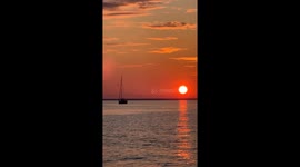 A scenic sunset on the shore of the Gulf of Finland in Tallinn