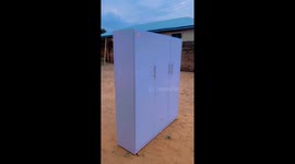 A 3 faced white mdf boarded materials wardrobe