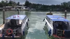 Tourists puzzled - as Porsche drives by on water