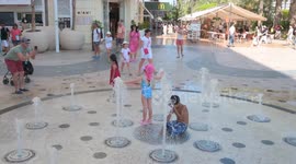 Alicante’s Sunshine and Strolls: Tourists’ Summer Day at the Beach and La Explanada