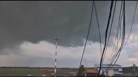 Planes flipped over and buildings damaged as tornado rips through Russian airport