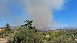 Smoke from the forest fire in the northern suburbs of Athens, Greece